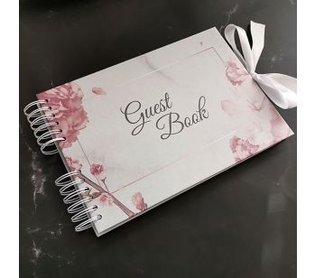 This is our fantastic looking Marble with Rose Gold Floral Frame Guestbook. A fantastic looking guestbook that is perfect for wedding photo booth events. This book is one of our new range of slip-in page guestbooks meaning you can effortlessly place your 